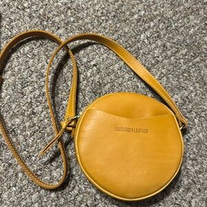 Portland leather circle crossbody.